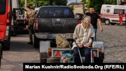 Херсон. Эвакуацыя грамадзян, пацярпелых ад зьнішчэньня Кахоўскай дамбы. Ілюстрацыйнае фота